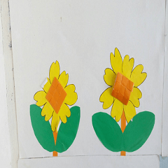 Colored paper cut into sunflowers