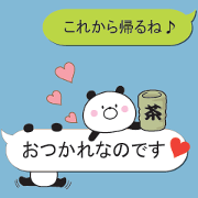 A small panda is attached to a balloon