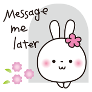 White Rabbit wearing a floral earring