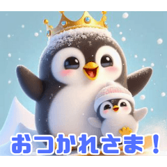 雪で遊ぶキングペンギン:日本語