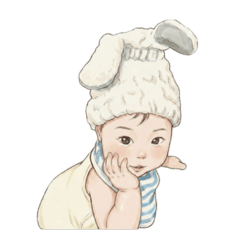 A fluffy towel hat and bunny ear baby