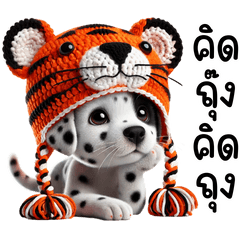 Dalmatian dog with a tiger hat