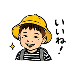 A young schoolboy wearing a yellow hat