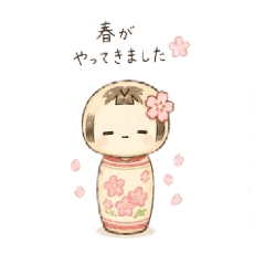 kokeshi doll and seasonal blossoms