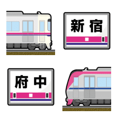 東京 ピンク/紺ラインの私鉄電車と駅名標