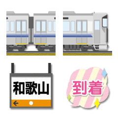 大阪〜和歌山 ライトブルーの電車と駅名標