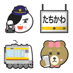 ジェシカと東京 黄/橙ラインの電車と駅名標
