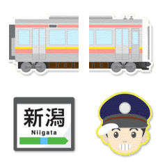 新潟 ピンク／黄ラインの電車と駅名標